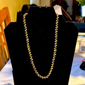 Gold Tone Necklace and Earrings with Green and White Rhinestones.